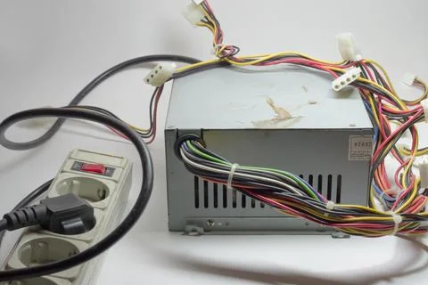 Computer ATX non-modular power supply unit front side with ventilation hole.. Stock Photos