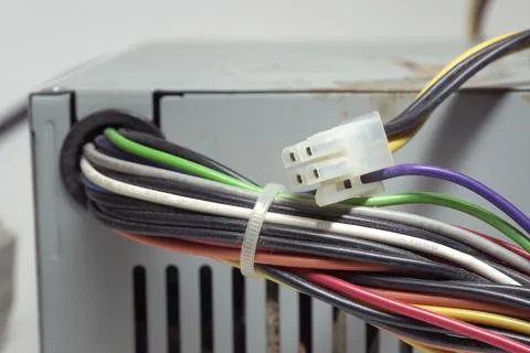 Computer ATX non-modular power supply unit front side. old power connectors.. Stock Photos