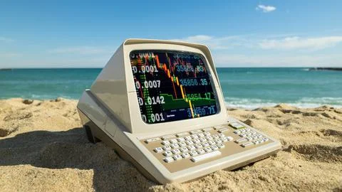 Computer on a beach with data and code on screen Foto stock