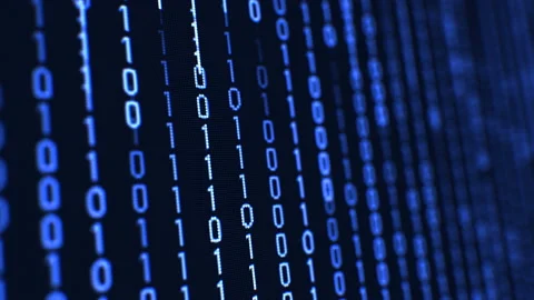Computer Binary Code Falling Like Matrix on the Data Screen with DOF Blur. Blue Stock Footage 87556240