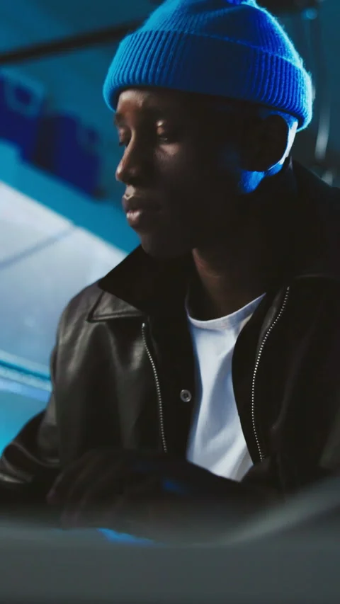 Computer, black man and night with hacker in server room for cybercrime, digital Stock Footage 333673150