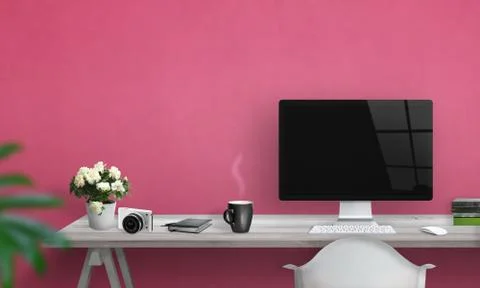     Computer with blank screen on office desk. Free space on wall for text. Pink Stock Photos