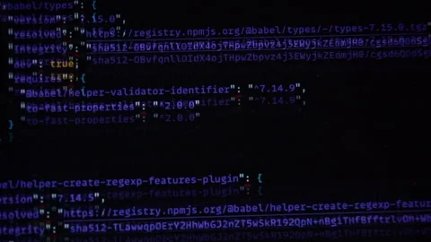 Computer blue code running over black screen of laptop Stock Footage 162928784