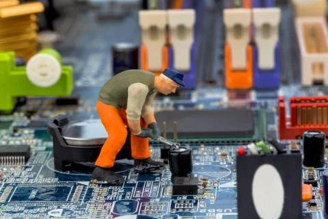 Computer board and construction workers Foto stock