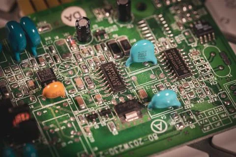 Computer board lies on a white keyboard Stock Photos