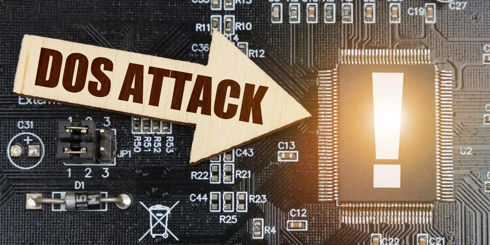 On the computer board, a microcircuit with an exclamation mark and an arrow w Stock Photos