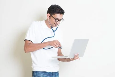 Computer bug or virus Spyware or malware concept. Indian computer engineer... Stock Photos