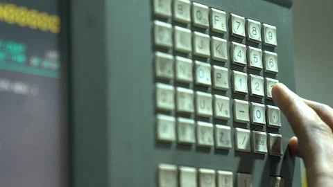Computer Buttons Being Pressed By A CNC Machine Operator While Being 库存影片 332137048