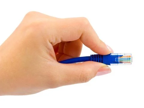 Computer cable in hand Computer cable in hand isolated on white background... Stock Photos