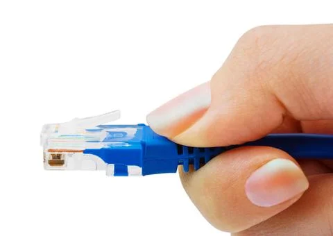 Computer cable in hand Computer cable in hand isolated on white background... Stock Photos