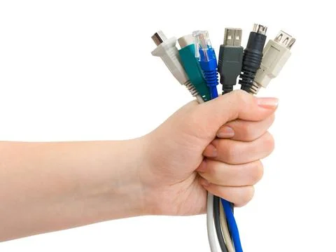 Computer cables in hand Computer cables in hand isolated on white backgrou... Stock Photos