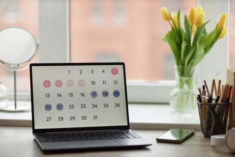 Computer with calendar on screen at workplace Stock Photos