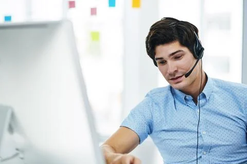 Computer, call center and man in office for customer service, banking or help Stock Photos