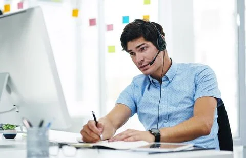 Computer, call center and man with notebook for customer service, banking or 스톡 사진
