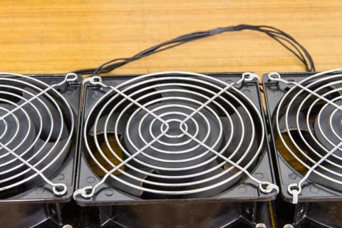 Computer case cooling fans on table Stock Photos