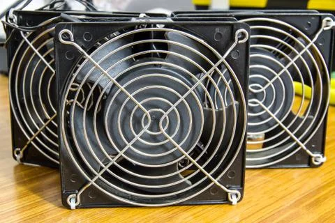 Computer case cooling fans on table Stock Photos