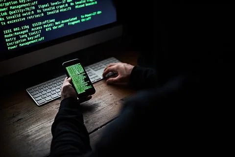 Computer, cellphone and hands for hacker, coding and scam or fintech for cyber Foto stock
