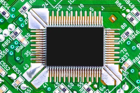 Computer chip and circuit board Stock Photos