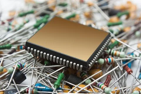 Computer chip on the background of electronic components Stock Photos