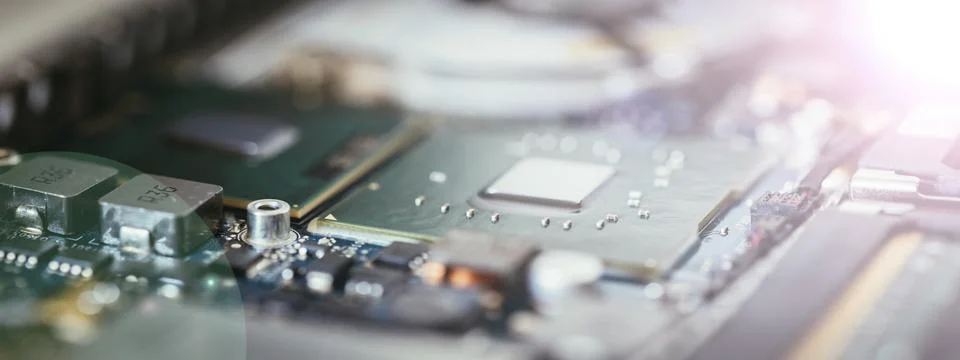Computer chip on a circuit board, close up with light effect. Computer Foto stock