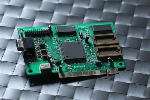 Computer chip isolated on a grey background Stock Photos