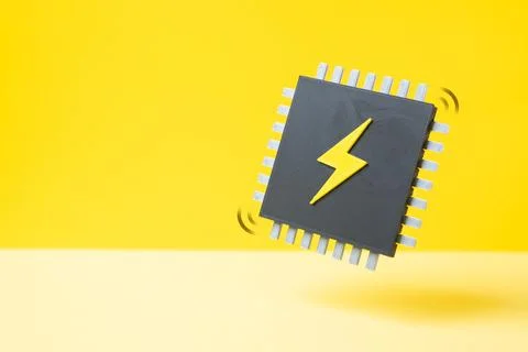 A computer chip with a lightning bolt symbol. Energy savings in data center.. Stock Photos