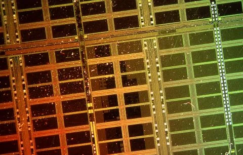 Computer chips with transistors and conductor tracks Stock Photos