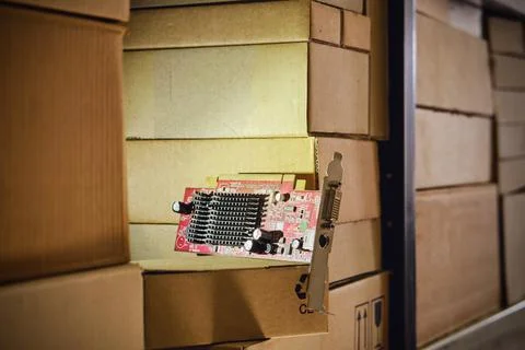 Computer chips video card in the warehouse room. The crisis of electronics gr Stock Photos