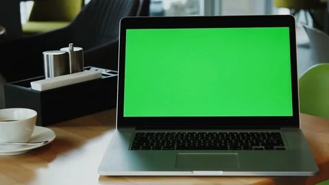 Computer with chroma key green screen at the table with cup of coffee Stock Footage 112993467
