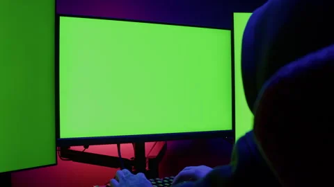 Computer with chroma key green screen on monitor. Gamer man playing in popular Stock Footage 270019886
