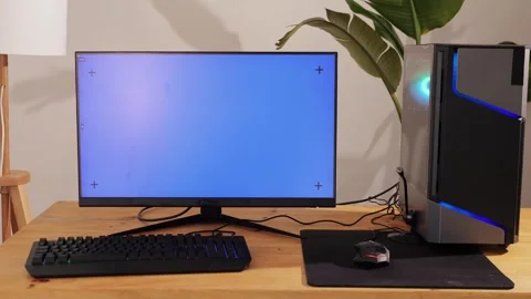 Computer with chroma key green screen on monitor. Gamer man playing in popular Stock Footage 270098836