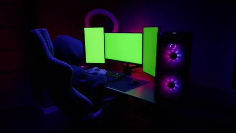 Computer with chroma key green screen on monitor. Gamer man playing in popular Stock Footage 271664353