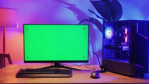 Computer with chroma key green screen on monitor. Gamer man playing in popular Stock Footage 272478312