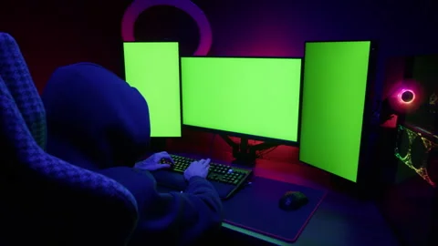Computer with chroma key green screen on monitor. Gamer man playing in popular Stock Footage 274147656
