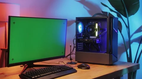 Computer with chroma key green screen on monitor. Gamer man playing in popular Stock Footage 275099570