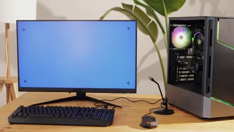 Computer with chroma key green screen on monitor. Gamer man playing in popular Stock Footage 277418599
