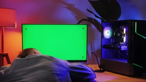 Computer with chroma key green screen on monitor. Gamer man playing in popular Stock Footage 280586917