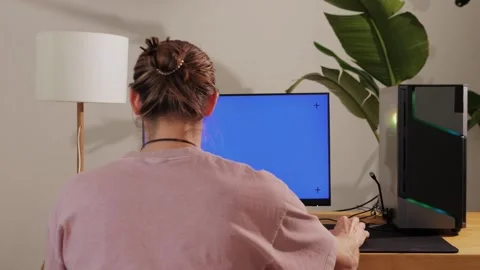 Computer with chroma key green screen on monitor. Gamer man playing in popular Stock Footage 285548256