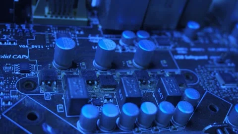 Computer circuit board in blue neon colors light, macro dolly shot, motherboard Stock Footage 276665866