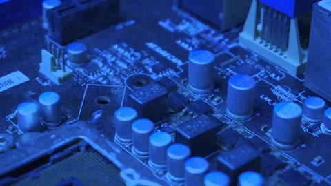 Computer circuit board in blue neon colors light, macro dolly shot, motherboard Stock Footage 276667613