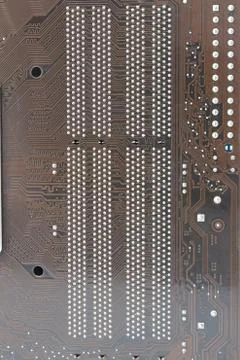 Computer circuit board brown pattern on a white background. Stock Photos