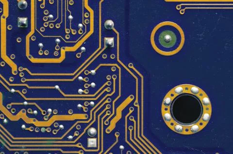 Computer circuit board close up. Background for the theme of electronics and Stock Photos