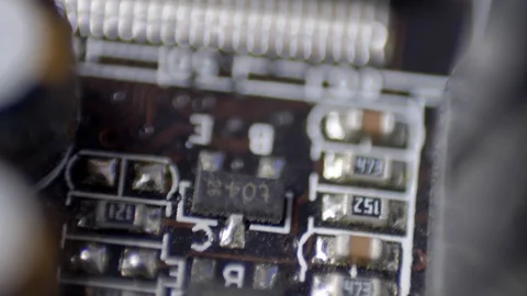 Computer Circuit Board with Electronic Chips Rotating Close Up Stock Footage 114609320