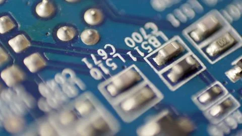 Computer Circuit Board with Electronic Chips Rotating Close Up 写真素材