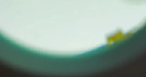 Computer circuit view in magnifying glass electrical engineer Stock Footage 336585481