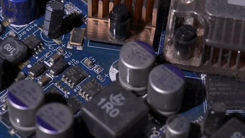 Computer circuits hardware. Motherboard part, chips, connections, circuit boards Stock Footage 80634372