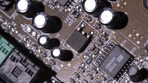 Computer circuits hardware. Motherboard part, chips, connections, circuit boards Stock Footage 80634417