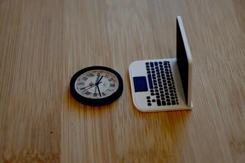 Computer with clock screen time digital detox concept with copy space Stock Photos