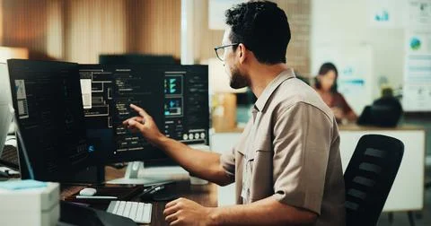 Computer, code and programmer with business man in office for web developer.. Stock Photos