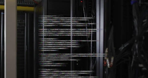 Computer code animation over server racks in data center Stock Footage 306507660